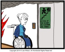 Person using a Wheechair looking at Non Emergency Elevator